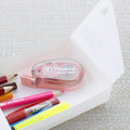 Bazic Tiny Bond Glue Tape with markers on a white surface