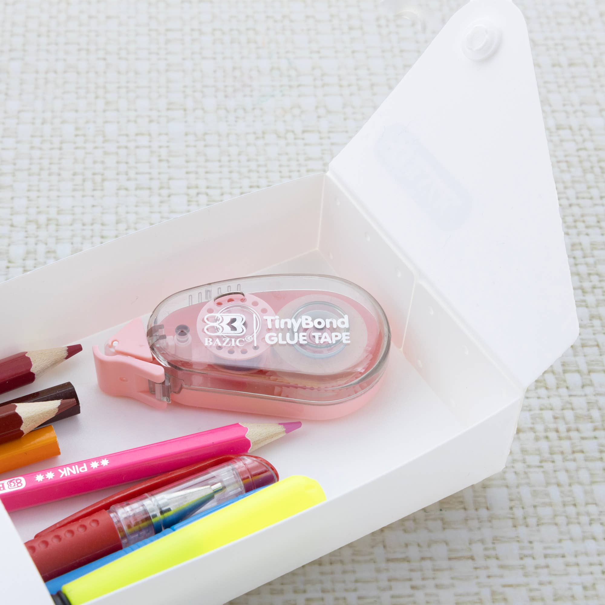 Bazic Tiny Bond Glue Tape with markers on a white surface