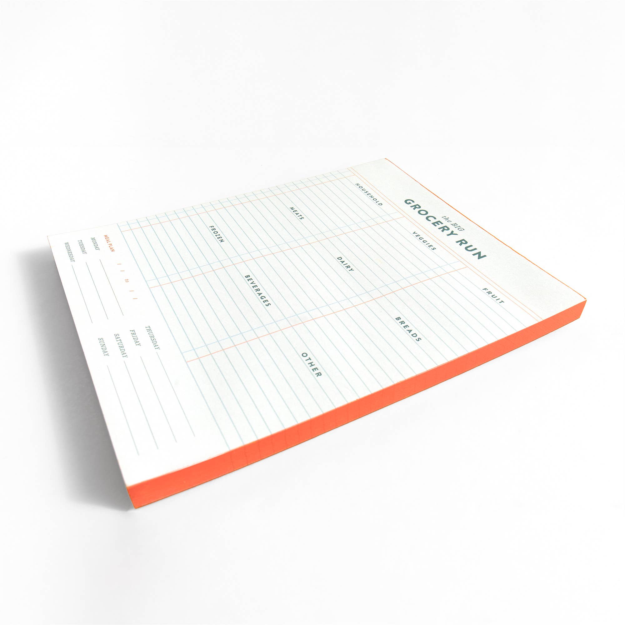 Notepad with a grocery list template on a white background