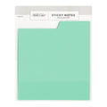 Mint green sticky notes with a white backing on a white background